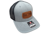 Richardson Adult Hat with custom laser engraved leather hat patch sewn on the front